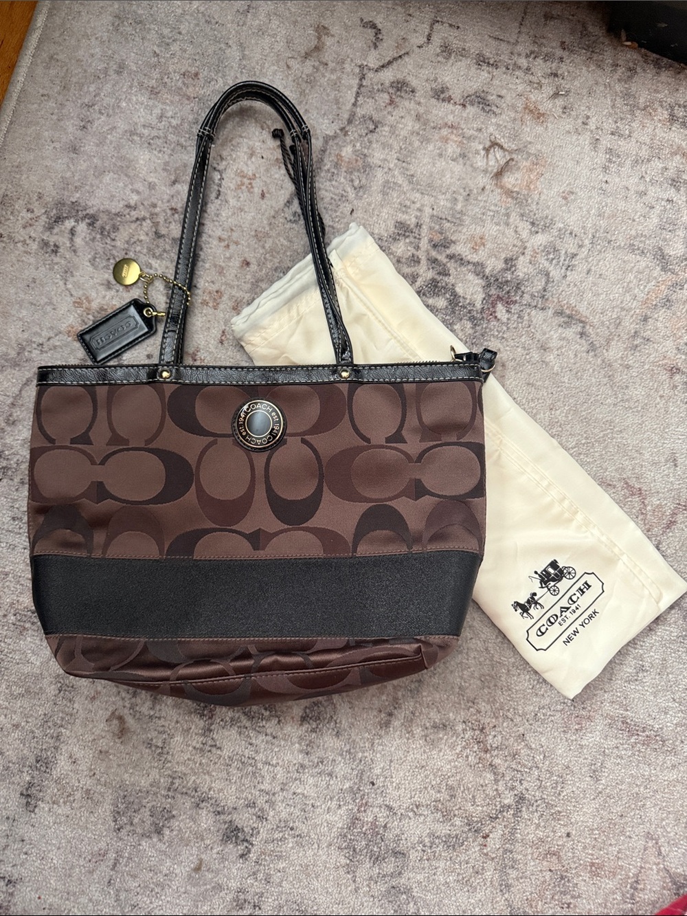 Coach Brown Signature Canvas Tote with Black Trim and Brass Accent